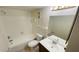 Simple bathroom featuring a tub and shower at 5504 Pokeweed Ct # 154, Tampa, FL 33617