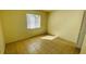 Bright bedroom with tile floors and a window at 5504 Pokeweed Ct # 154, Tampa, FL 33617