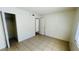 Spacious bedroom with tile floors and a closet at 5504 Pokeweed Ct # 154, Tampa, FL 33617