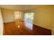 Bright living room with tile floors and sliding glass doors leading to a patio at 5504 Pokeweed Ct # 154, Tampa, FL 33617