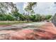 Well-maintained tennis court in a community setting, ready for play at 5504 Pokeweed Ct # 154, Tampa, FL 33617