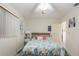 Bedroom with double bed, nightstand, and ceiling fan at 6540 Marius Rd, North Port, FL 34287