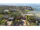 Aerial view of waterfront homes and community at 103 Shore Dr, Dunedin, FL 34698