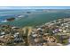 Aerial view of waterfront homes and community at 103 Shore Dr, Dunedin, FL 34698