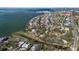 Aerial view of waterfront homes and neighborhood at 103 Shore Dr, Dunedin, FL 34698