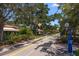 Scenic Dunedin bike path with lush landscaping at 103 Shore Dr, Dunedin, FL 34698