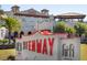 Hotel Fenway sign with a rooftop bar at 103 Shore Dr, Dunedin, FL 34698