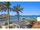 Charming pergola overlooking the waterfront at 103 Shore Dr, Dunedin, FL 34698