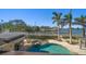 Relaxing pool and spa with waterfront view and patio at 103 Shore Dr, Dunedin, FL 34698