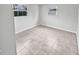 Simple bedroom with tile flooring and neutral walls at 10510 114Th Ter, Largo, FL 33773