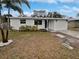 Newly renovated home with a landscaped front yard at 10510 114Th Ter, Largo, FL 33773