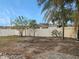 Large backyard with a privacy fence and room for landscaping at 1502 Silktree Ct, Brandon, FL 33511