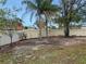 Empty backyard area with some trees at 1502 Silktree Ct, Brandon, FL 33511