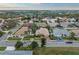 Aerial view of single Gathering home in residential neighborhood at 7419 Roxye Ln, Sarasota, FL 34240