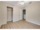 Spacious bedroom featuring wood-look floors and ample closet space at 1006 Vista Cay Ct, Brandon, FL 33511