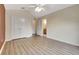 Main bedroom with double doors to en-suite bath at 1006 Vista Cay Ct, Brandon, FL 33511