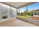 Screened-in porch overlooking the backyard at 1006 Vista Cay Ct, Brandon, FL 33511