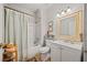 Clean bathroom with white vanity and updated fixtures at 3000 21St S Ave, St Petersburg, FL 33712