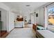 Bright bedroom with wood floors, access to backyard, and ample natural light at 3000 21St S Ave, St Petersburg, FL 33712