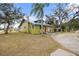 Charming green house with a unique architectural style and landscaping at 3000 21St S Ave, St Petersburg, FL 33712