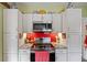 Modern kitchen with stainless steel appliances and granite countertops at 3000 21St S Ave, St Petersburg, FL 33712