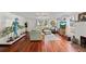 Spacious living room with hardwood floors, fireplace, and ample natural light at 3000 21St S Ave, St Petersburg, FL 33712