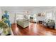 Spacious living room with hardwood floors, fireplace, and ample natural light at 3000 21St S Ave, St Petersburg, FL 33712