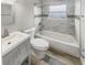 Updated bathroom with marble-look tile and a new bathtub at 5466 9Th N Ave, St Petersburg, FL 33710
