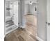 Clean bathroom with a bathtub and shower at 5466 9Th N Ave, St Petersburg, FL 33710