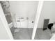 Laundry room with water heater and utility hookups at 5466 9Th N Ave, St Petersburg, FL 33710