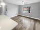 Bright living room with hardwood floors and large window at 5466 9Th N Ave, St Petersburg, FL 33710