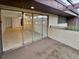 Sliding glass doors lead to a balcony with view of living area at 705 S Village N Dr # 205, St Petersburg, FL 33716