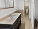 Updated bathroom with vanity and toilet at 705 S Village N Dr # 205, St Petersburg, FL 33716