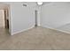 Simple bedroom with tile floors and ample closet space at 705 S Village N Dr # 205, St Petersburg, FL 33716