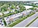 Aerial view of condo building near water at 4455 Duhme Rd # 205, St Petersburg, FL 33708