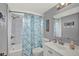 Clean bathroom with a shower/tub combo, tile flooring, and updated vanity at 4455 Duhme Rd # 205, St Petersburg, FL 33708