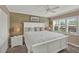 Bright bedroom with king bed and beach themed decor at 4455 Duhme Rd # 205, St Petersburg, FL 33708