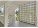 Stairwell with decorative wall and view of surrounding area at 4455 Duhme Rd # 205, St Petersburg, FL 33708