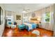 Bright bedroom with hardwood floors, and ample natural light at 105 17Th Ne Ave, St Petersburg, FL 33704