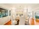 Elegant dining room with hardwood floors and round table at 105 17Th Ne Ave, St Petersburg, FL 33704