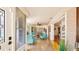 Entryway with view of sunroom and hardwood floors at 105 17Th Ne Ave, St Petersburg, FL 33704