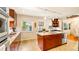 Modern kitchen with granite countertops and wood cabinets at 105 17Th Ne Ave, St Petersburg, FL 33704