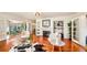 Living room with hardwood floors, fireplace, and cowhide rug at 105 17Th Ne Ave, St Petersburg, FL 33704