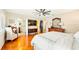 Bright bedroom with hardwood floors and en-suite bathroom at 105 17Th Ne Ave, St Petersburg, FL 33704