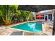 Inviting backyard oasis featuring a refreshing pool and relaxing spa at 105 17Th Ne Ave, St Petersburg, FL 33704