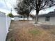 Large backyard with mature trees and a shed at 6320 Cedar St Ne, St Petersburg, FL 33702