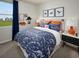 Dinosaur themed bedroom with a full bed and nightstands at 1860 Brekey Way, Zephyrhills, FL 33541