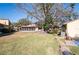 View of backyard and neighboring homes at 2101 Sunset Point Rd # 2304, Clearwater, FL 33765