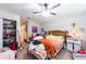 Main bedroom with a large bed and walk-in closet at 2101 Sunset Point Rd # 2304, Clearwater, FL 33765