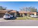 Front view of the house and driveway at 2101 Sunset Point Rd # 2304, Clearwater, FL 33765